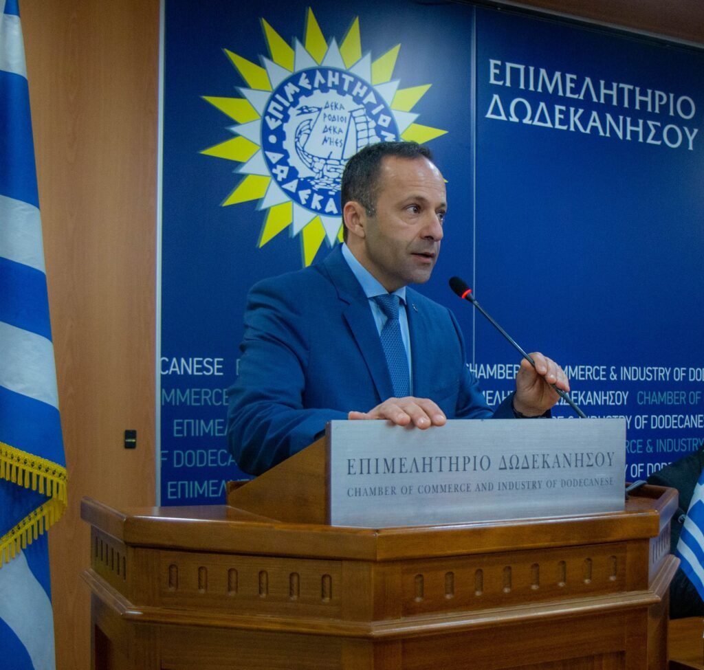 man speaking at podium