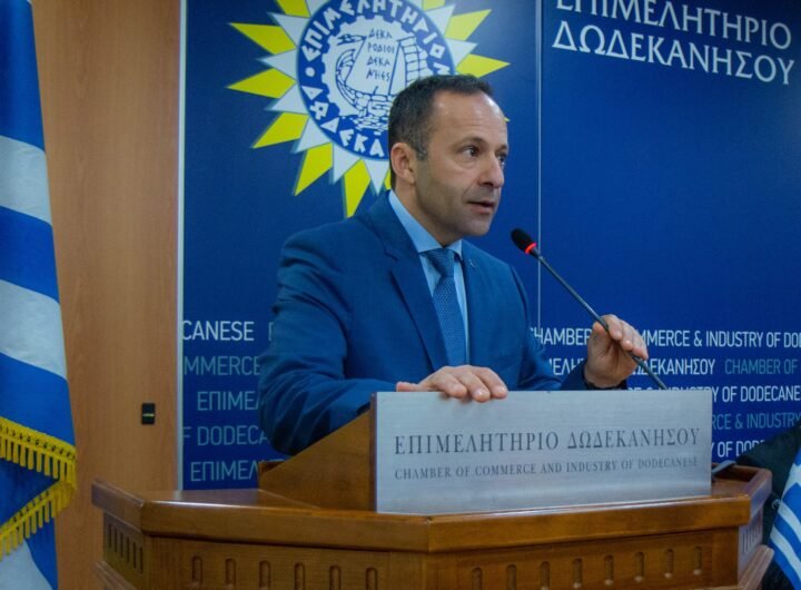 man speaking at podium